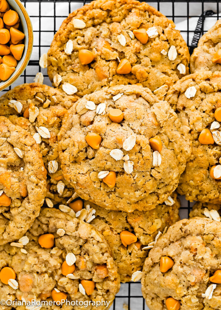 Eggless Oatmeal Scotchies Cookies over a cooling rack.